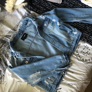 Distressed cropped denim jacket